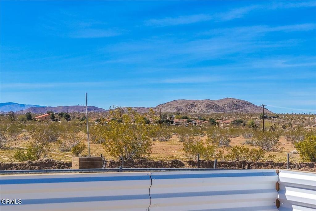61714 Commercial Street Joshua Tree, CA 92252 - Photo 28 of 42 a view of ocean with a mountain