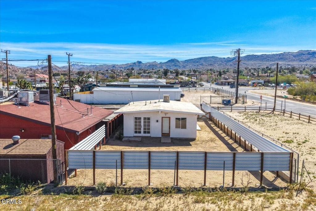 61714 Commercial Street Joshua Tree, CA 92252 - Photo 31 of 42 a view of a terrace with a lake view