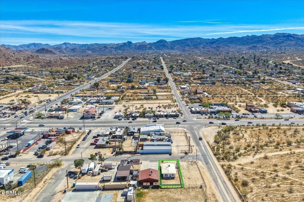 61714 Commercial Street Joshua Tree, CA 92252 - Photo 34 of 42 an aerial view of residential building and ocean