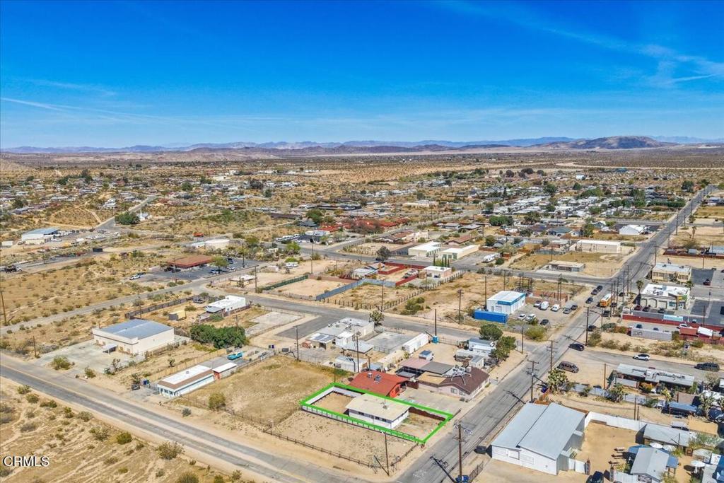61714 Commercial Street Joshua Tree, CA 92252 - Photo 40 of 42 an aerial view of residential building and ocean