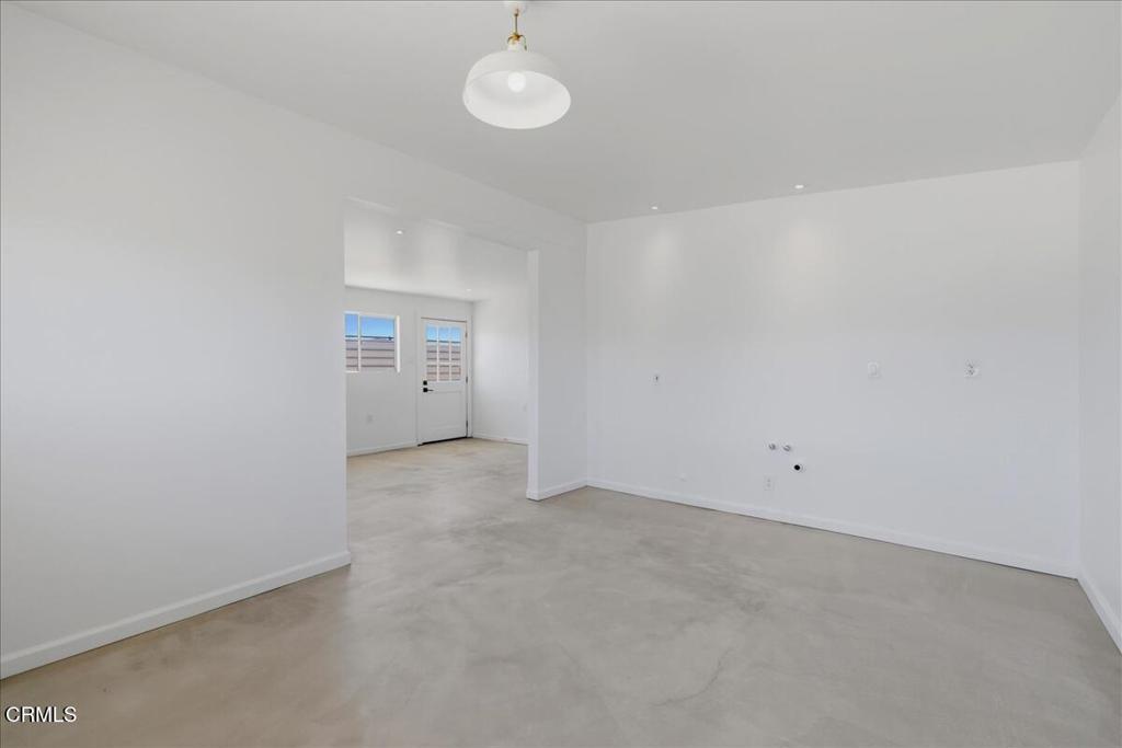 61714 Commercial Street Joshua Tree, CA 92252 - Photo 8 of 42 a view of an empty room with a window