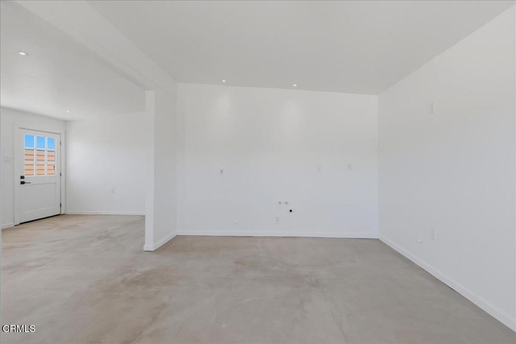 61714 Commercial Street Joshua Tree, CA 92252 - Photo 10 of 42 an empty room with a empty space and windows