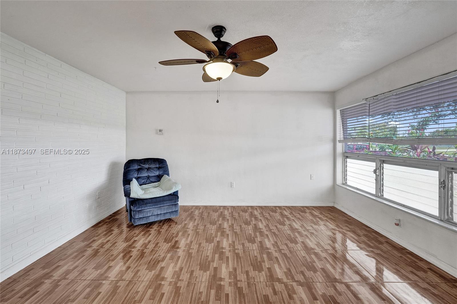 3330 Taft Street Hollywood, FL 33021 - Photo 16 of 70 a living room with hard wood floor and a window