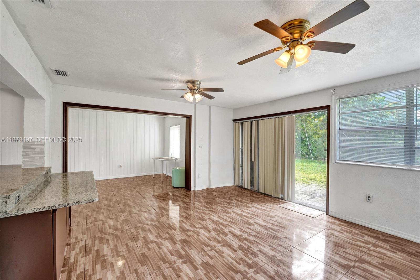 3330 Taft Street Hollywood, FL 33021 - Photo 38 of 70 a view of an empty room with a window