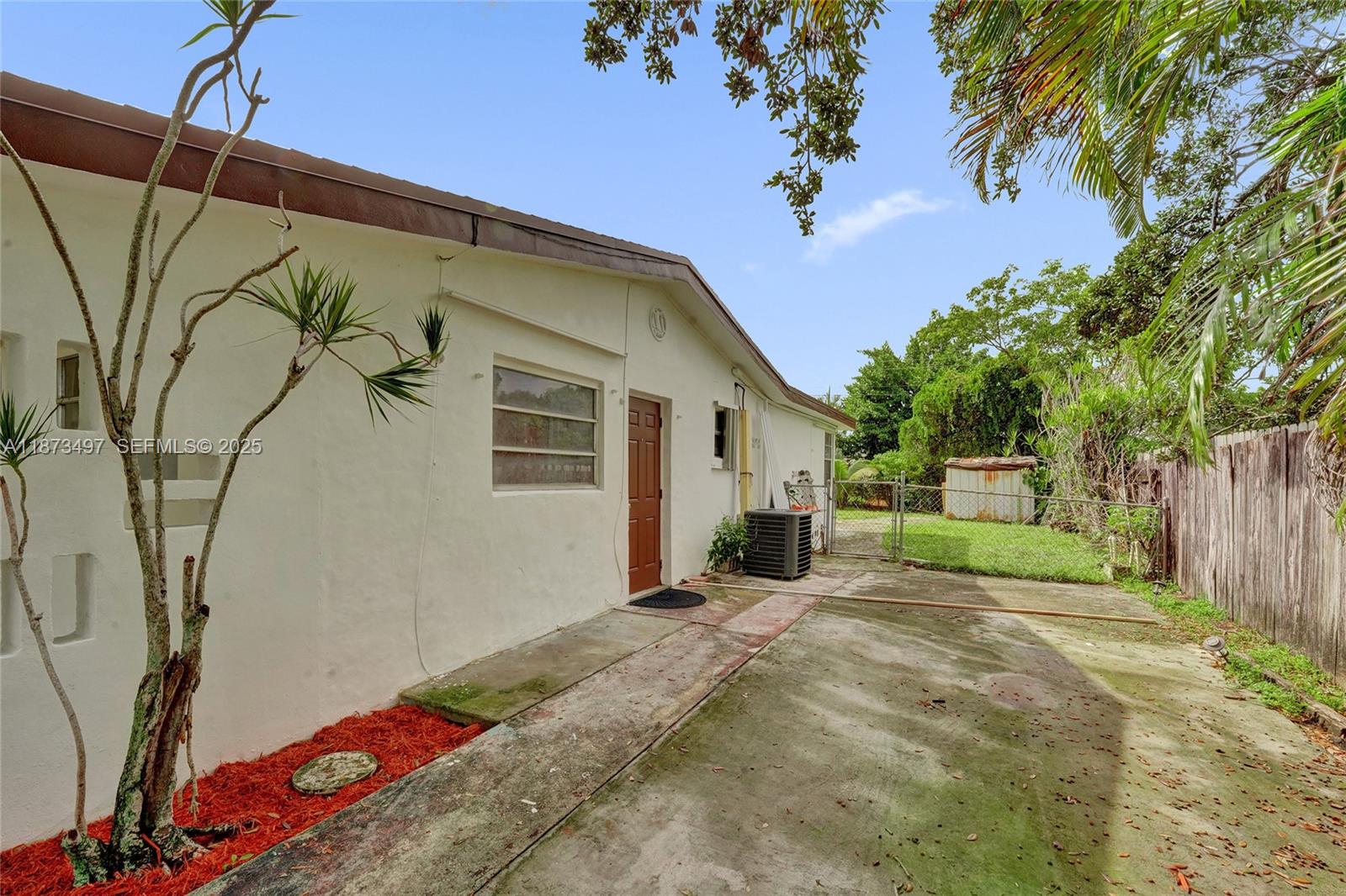 3330 Taft Street Hollywood, FL 33021 - Photo 69 of 70 a view of a house with a yard