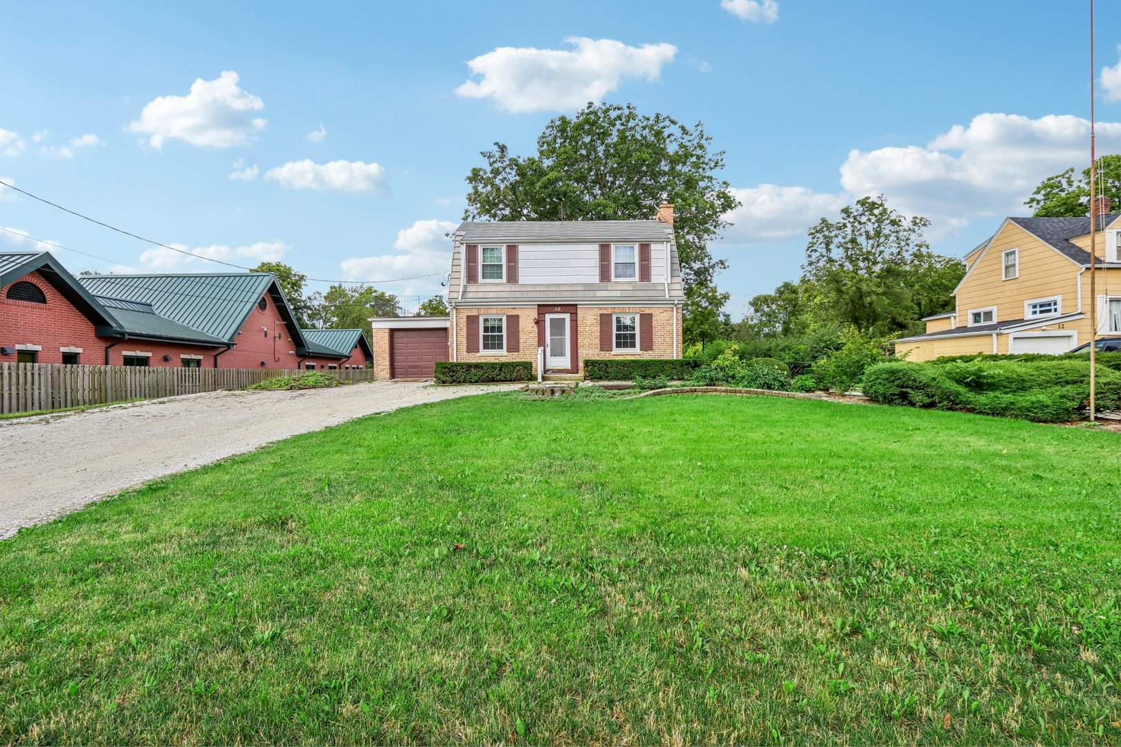 10 North Elmhurst Road Prospect Heights, IL 60070 - Photo 1 of 50 a view of a house with a yard and sitting area