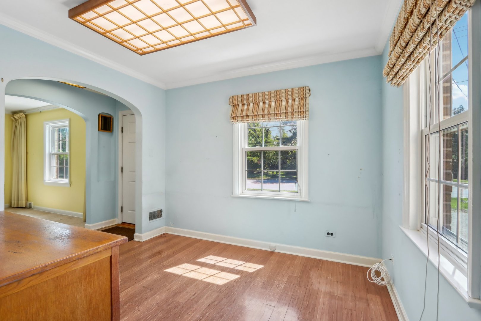 10 North Elmhurst Road Prospect Heights, IL 60070 - Photo 12 of 50 a room with a bed and a window