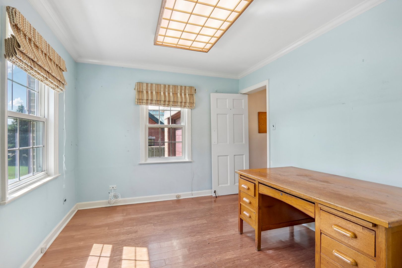 10 North Elmhurst Road Prospect Heights, IL 60070 - Photo 14 of 50 a view of an empty room with a window
