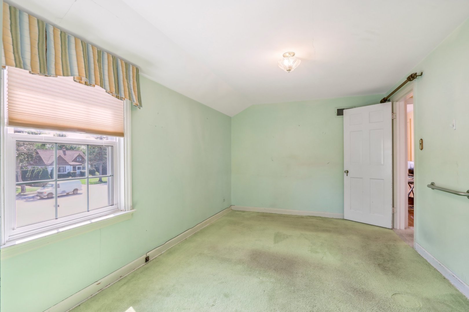 10 North Elmhurst Road Prospect Heights, IL 60070 - Photo 17 of 50 a view of an empty room with a window