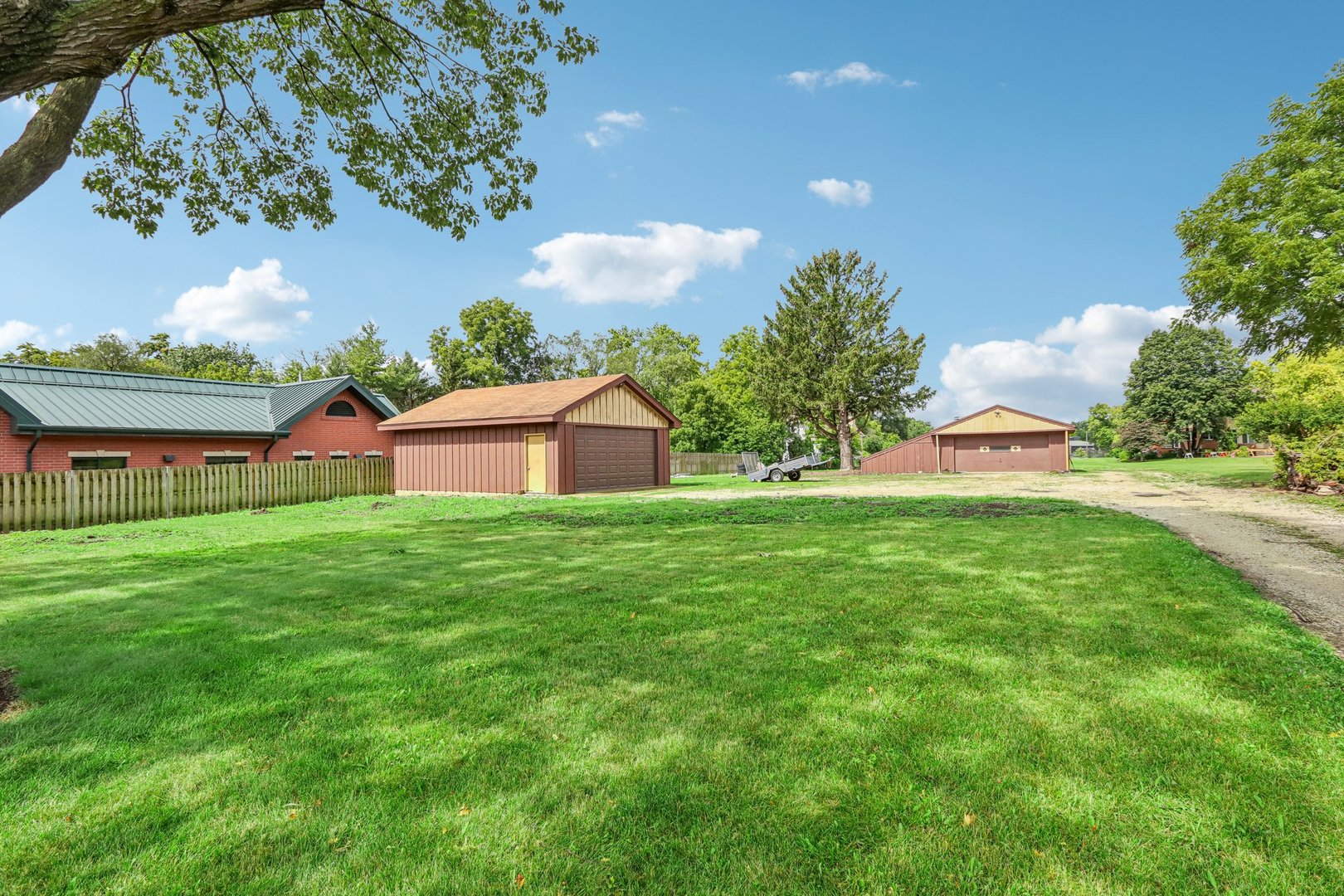 10 North Elmhurst Road Prospect Heights, IL 60070 - Photo 2 of 50 a view of house with backyard and garden