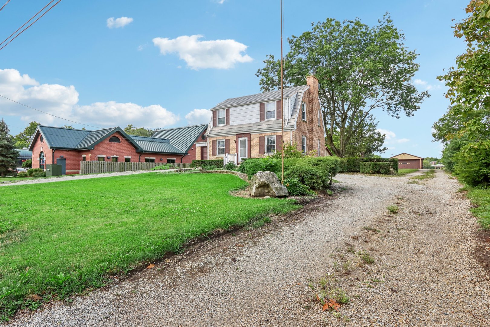10 North Elmhurst Road Prospect Heights, IL 60070 - Photo 29 of 50 a view of a house with a yard and porch