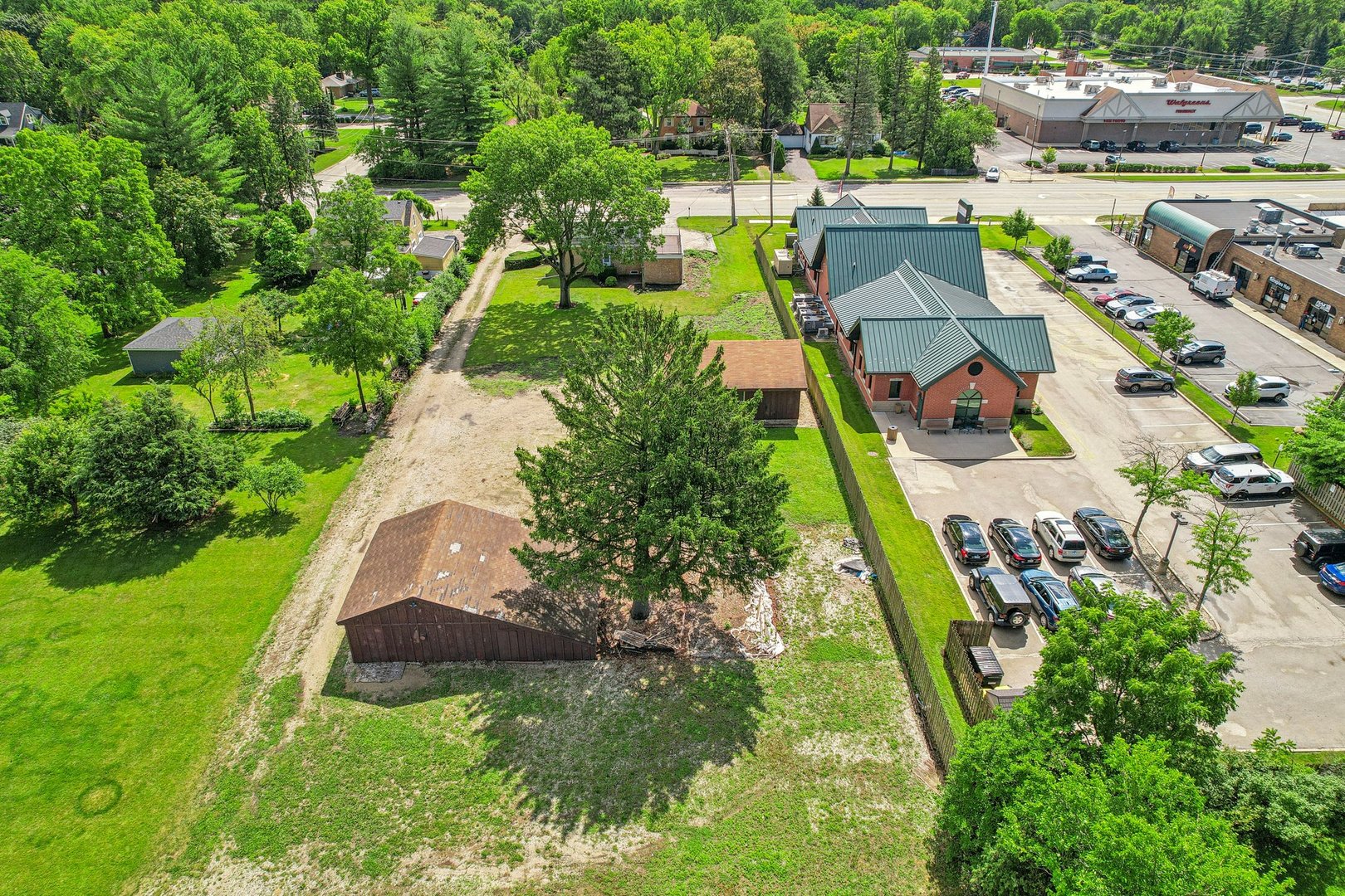 10 North Elmhurst Road Prospect Heights, IL 60070 - Photo 3 of 50 an aerial view of residential houses with outdoor space