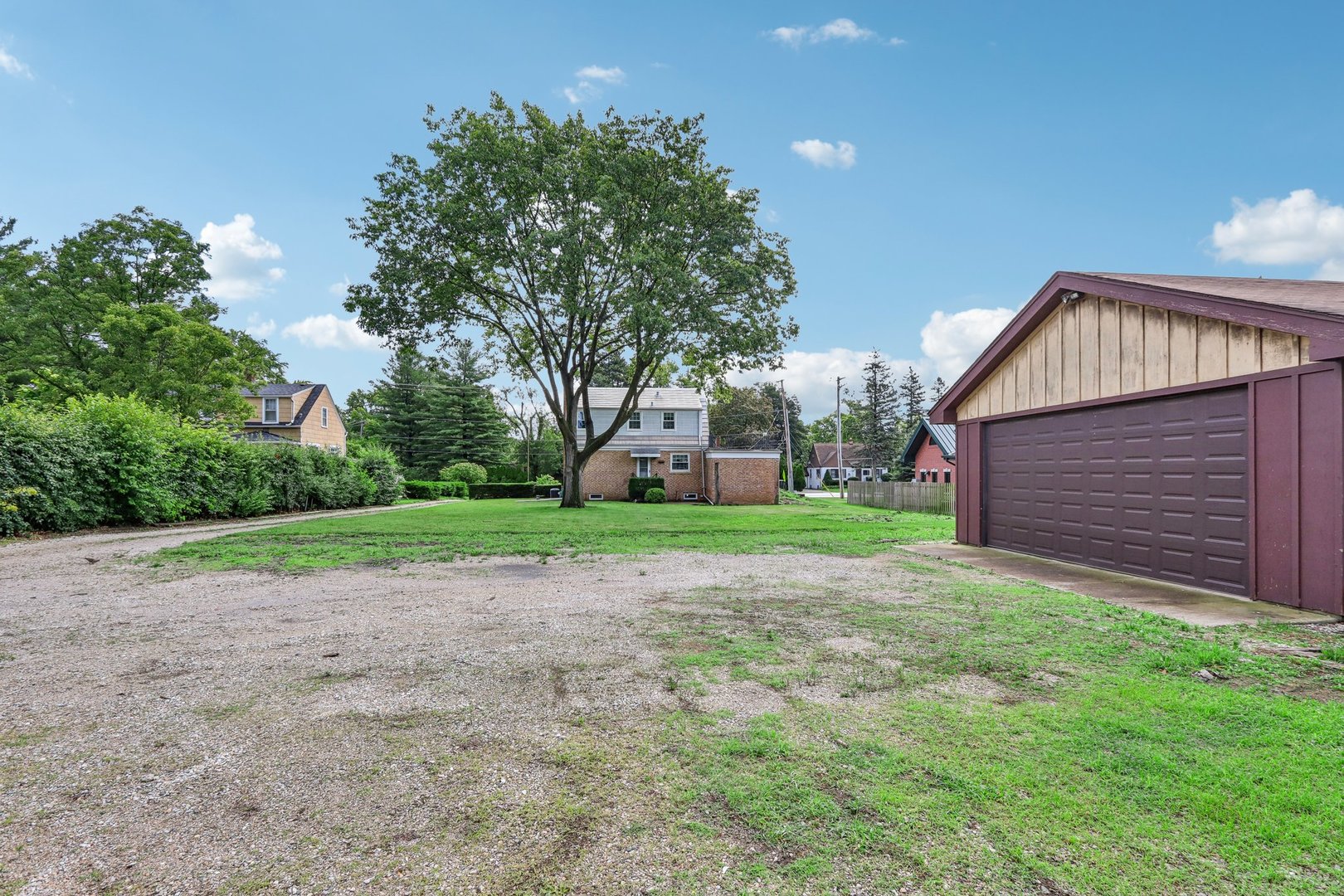 10 North Elmhurst Road Prospect Heights, IL 60070 - Photo 35 of 50 a view of a house with a yard
