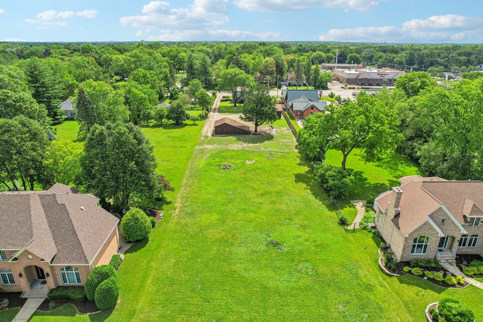10 North Elmhurst Road Prospect Heights, IL 60070 - Photo 43 of 50 an aerial view of residential house with outdoor space and trees all around