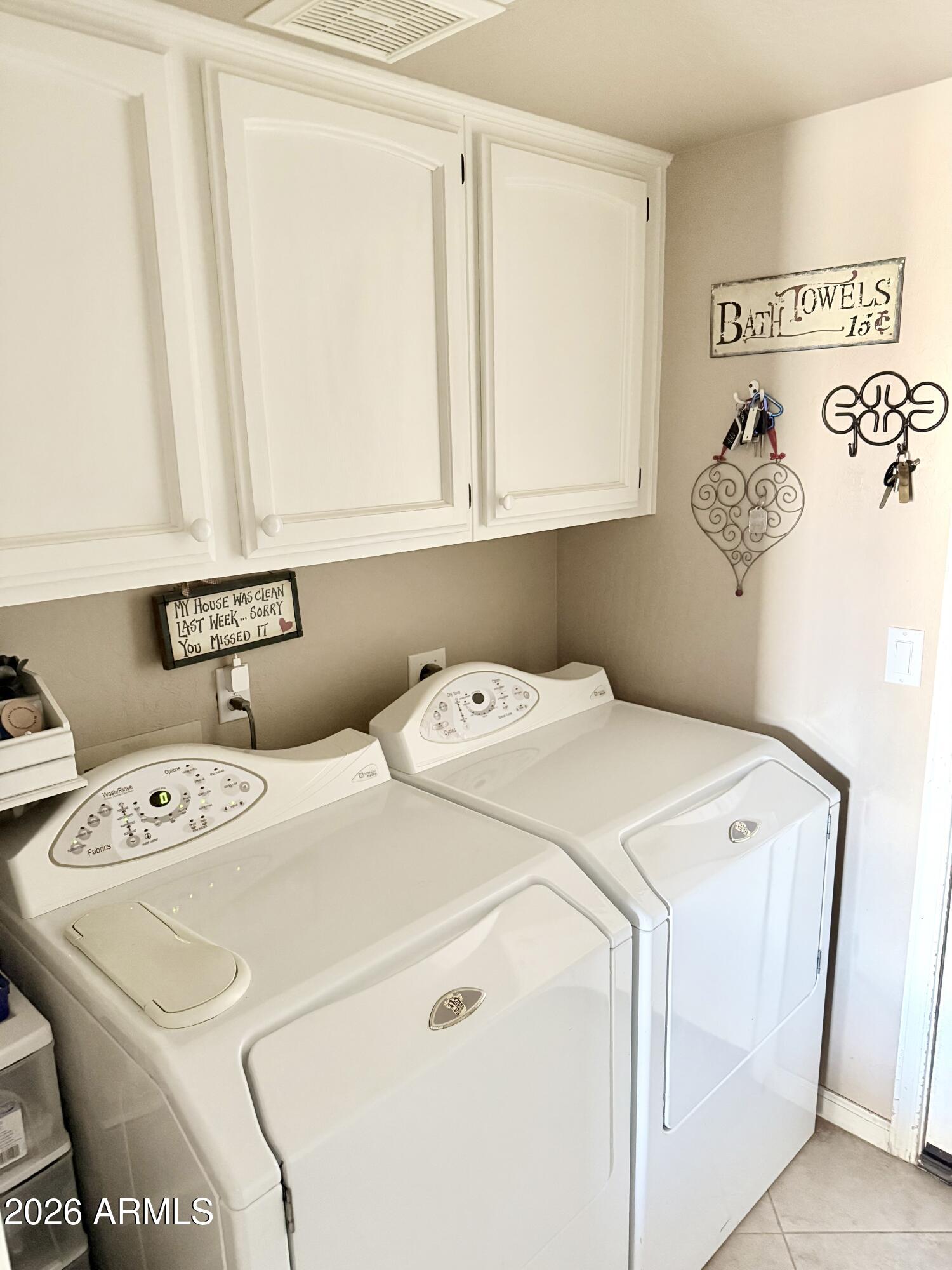 3426 East Clark Road Phoenix, AZ 85050 - Photo 17 of 48 a utility room with dryer and washer