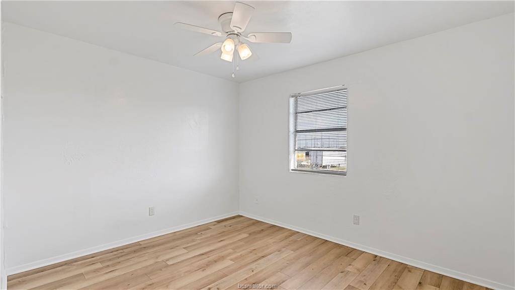 2712 Evergreen Circle Bryan, TX 77801 - Photo 16 of 30 Spare room with light hardwood / wood-style flooring and ceiling fan