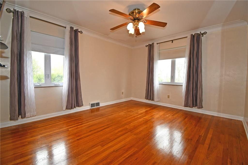 1326 Lesnett Road Pittsburgh, PA 15241 - Photo 17 of 45 Exposed Hardwood Flooring, ceiling fan.