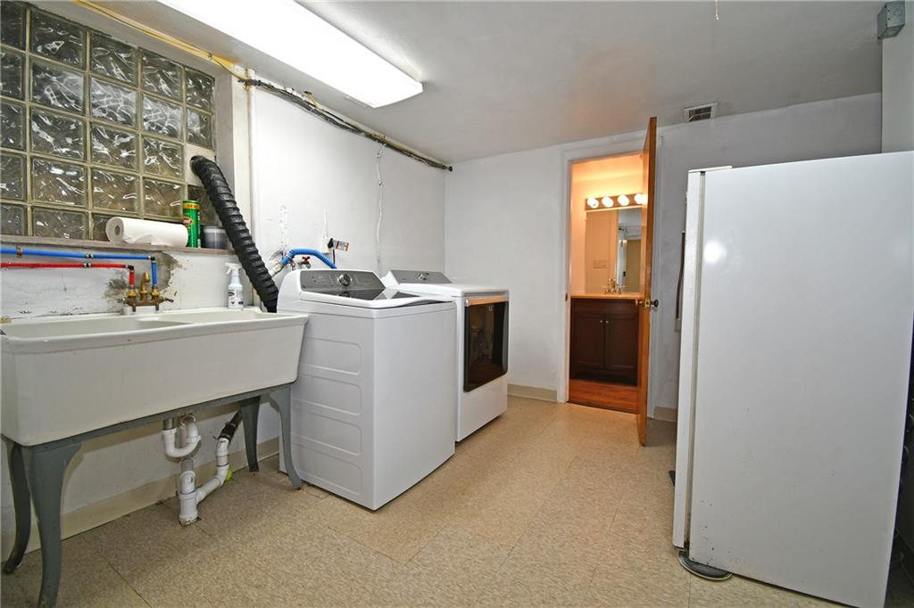 1326 Lesnett Road Pittsburgh, PA 15241 - Photo 32 of 45 Generous sized laundry room complete with double sink laundry tub!