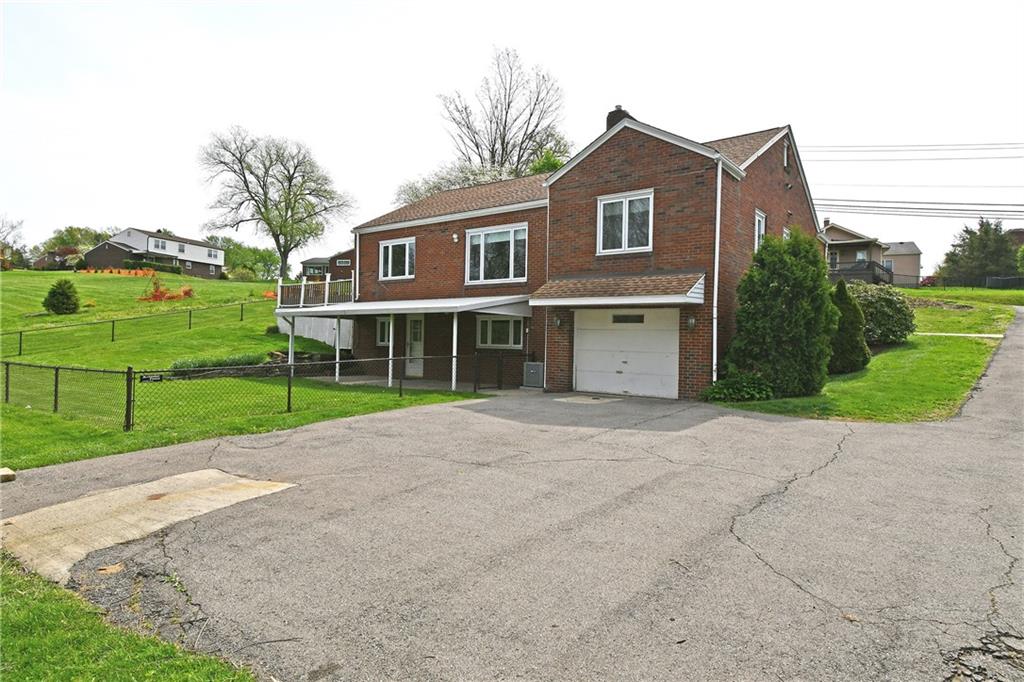 1326 Lesnett Road Pittsburgh, PA 15241 - Photo 42 of 45 2 car tandem garage, large driveway - plenty of room for parking.