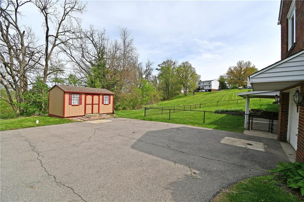 1326 Lesnett Road Pittsburgh, PA 15241 - Photo 43 of 45 Storage shed for all your gardening, lawn care equipment, as well as a workshop area.