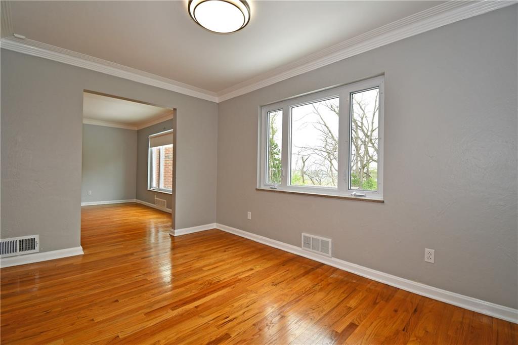 1326 Lesnett Road Pittsburgh, PA 15241 - Photo 8 of 45 Large window offering natural light as well as views of the backyard, nature!