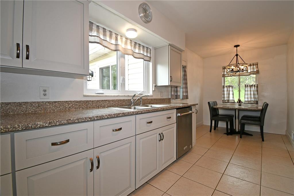 1326 Lesnett Road Pittsburgh, PA 15241 - Photo 10 of 45 Updated eat-in kitchen. Table and chairs - tabletop matches countertops and are included.