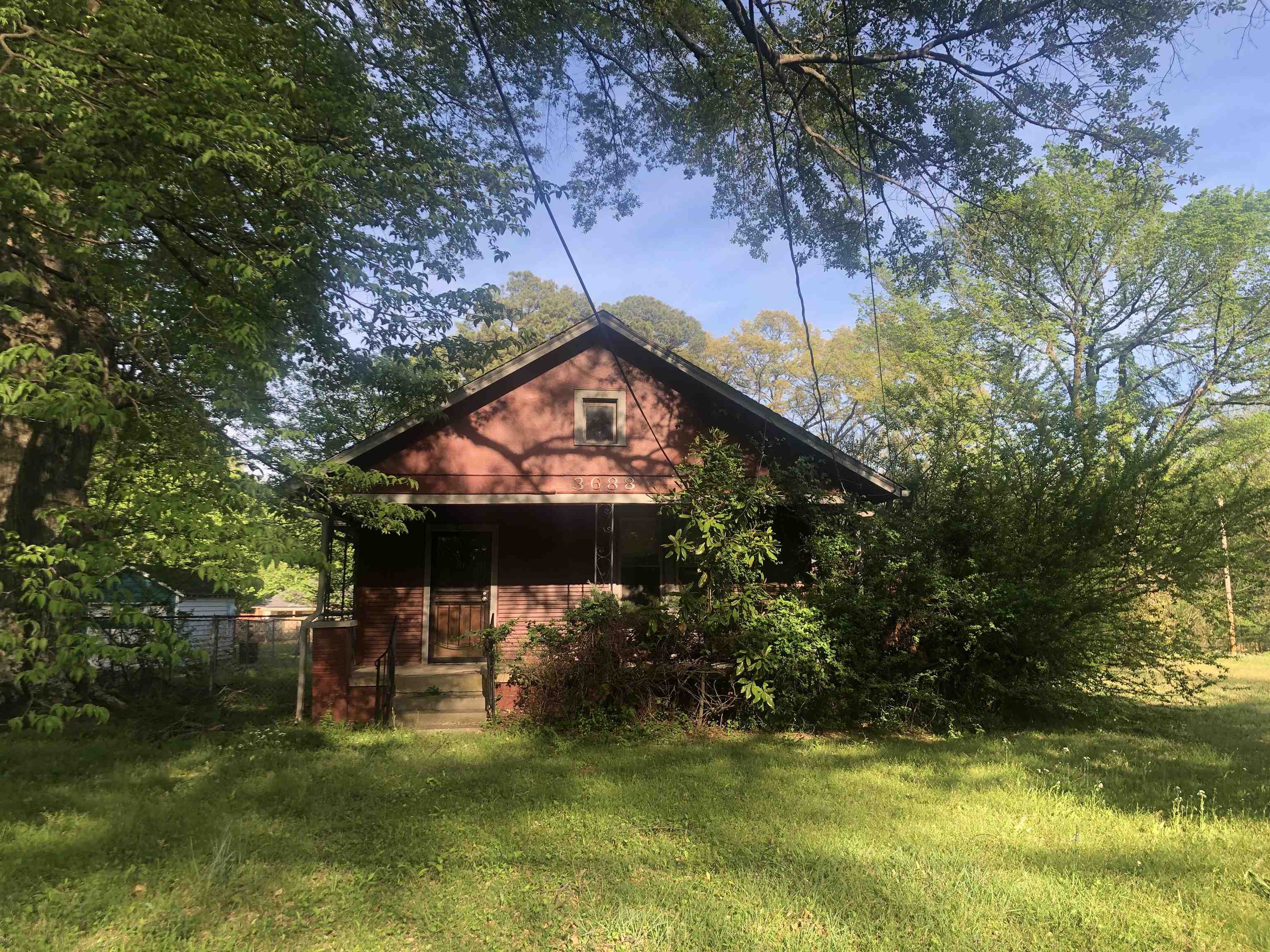 3688 Graves Road Memphis, TN 38116 - Photo 1 of 23 a view of a house with a swimming pool