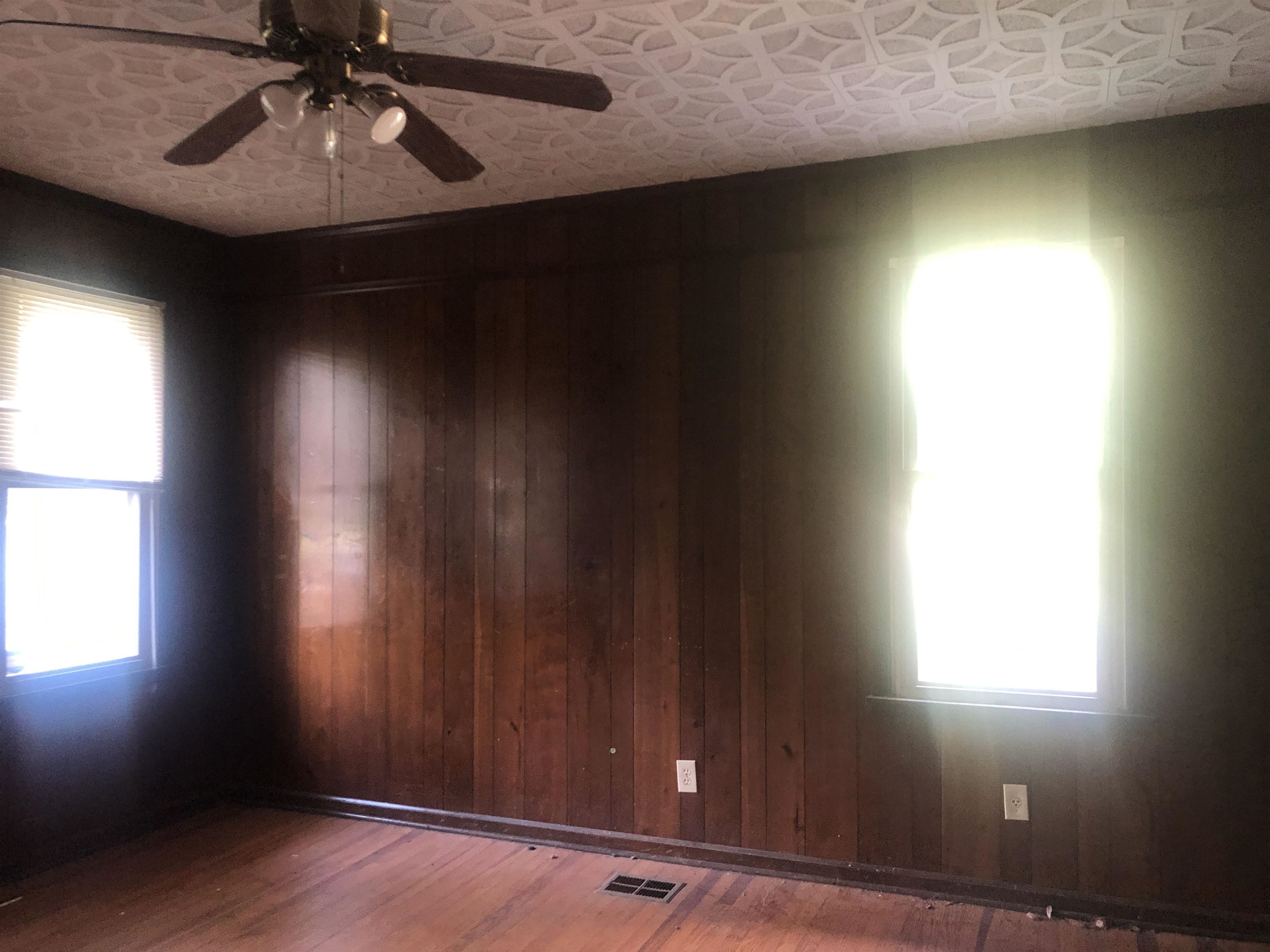 3688 Graves Road Memphis, TN 38116 - Photo 14 of 23 wooden floor in an empty room with a window