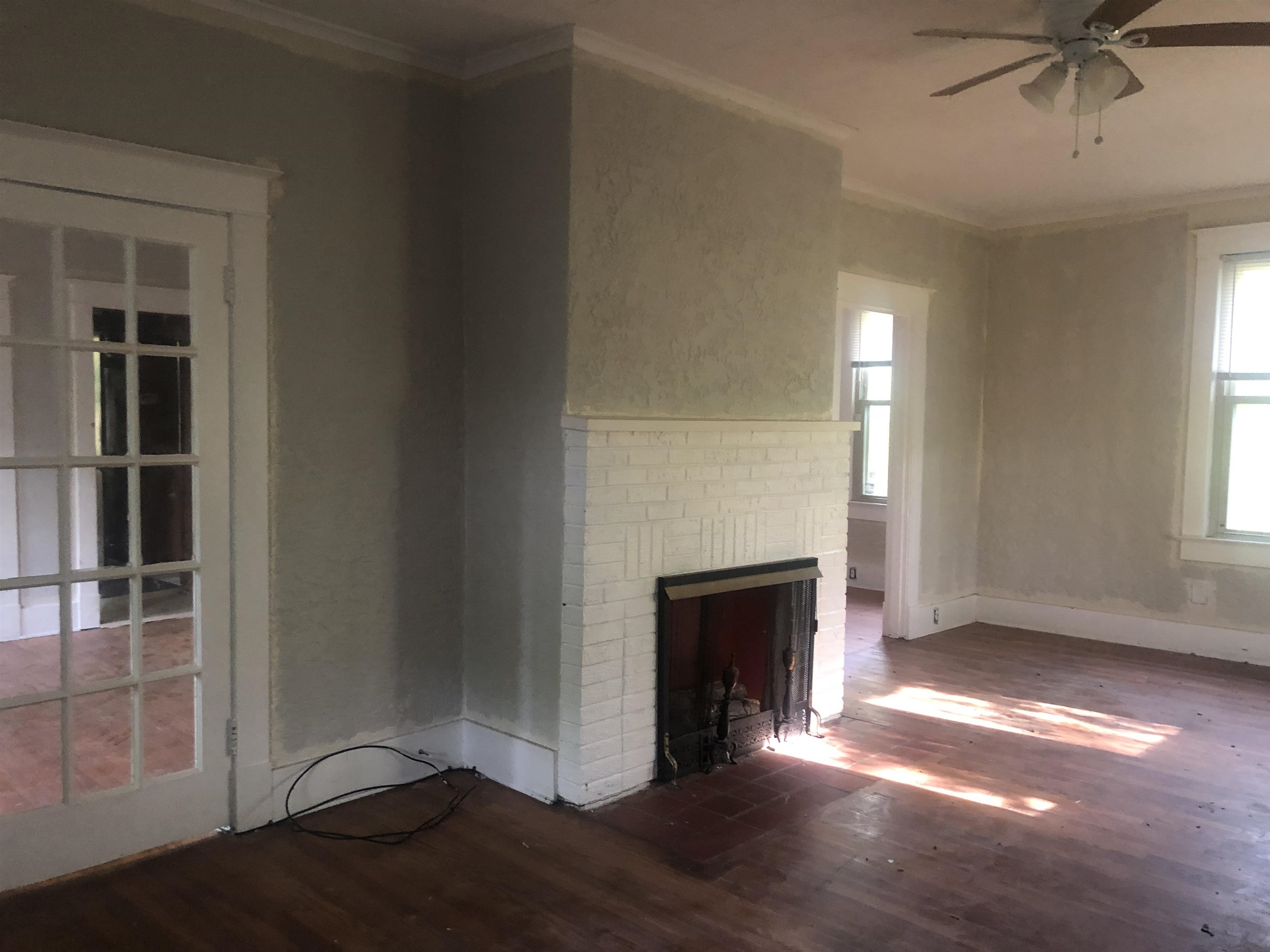 3688 Graves Road Memphis, TN 38116 - Photo 10 of 23 a view of empty room with a fireplace