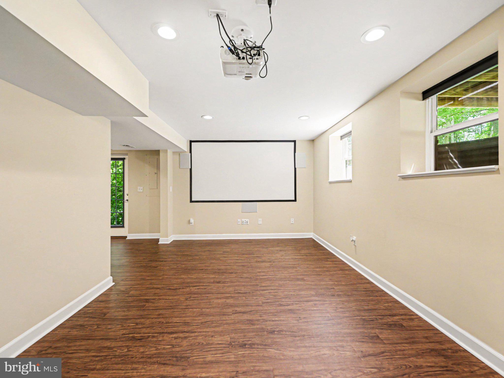 9811 Catharpin Road Spotsylvania, VA 22551 - Photo 15 of 30 a view of an empty room with wooden floor and a window