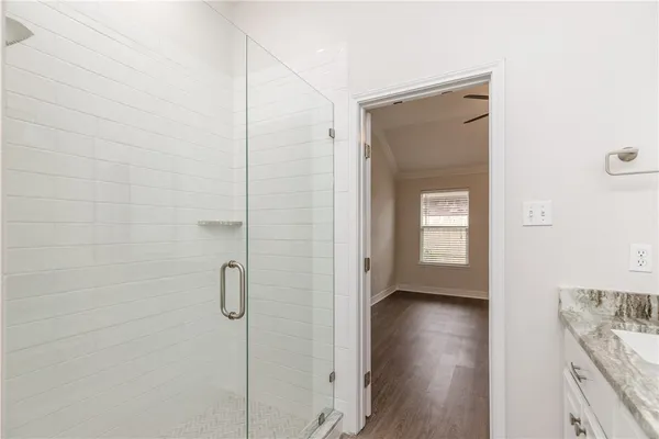 a view of a hallway with closet and entryway