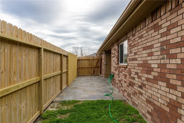 a view of backyard with door