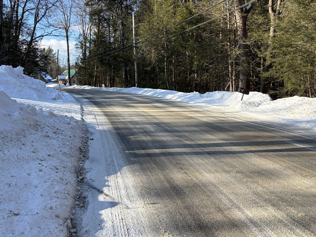 11 South Chesterfield Road Goshen, MA 01096 - Photo 4 of 26 a view of snow on the side of a road