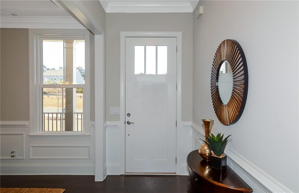 4316 Azalea Rdg Way Hoschton, GA 30548 - Photo 4 of 36 a front view of a house with garden