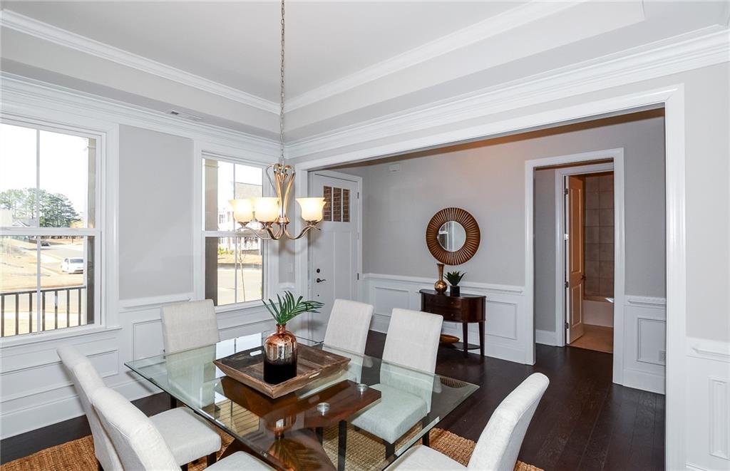 4316 Azalea Rdg Way Hoschton, GA 30548 - Photo 6 of 36 a living room with furniture and a window