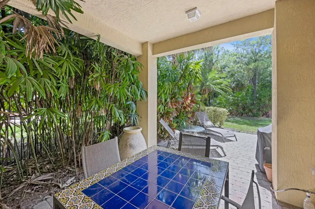 a view of living room with furniture and wooden floor