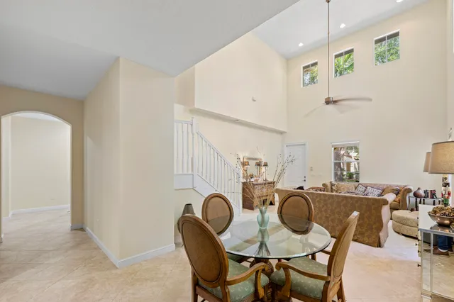 a kitchen with stainless steel appliances kitchen island granite countertop a sink and cabinets