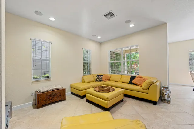 a kitchen with stainless steel appliances granite countertop a sink stove and microwave