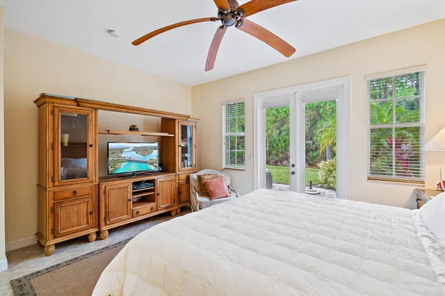 a living room with furniture a couch and a window