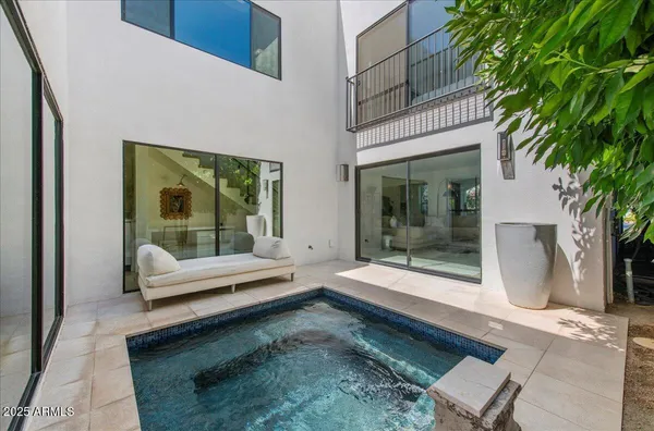 a building outdoor space with patio furniture