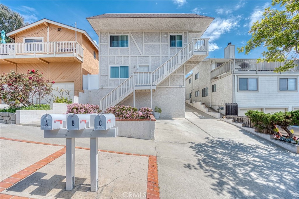33782 Malaga Drive, Unit C Dana Point, CA 92629 - Photo 8 of 11 a view of house with outdoor space and sitting area