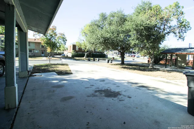 a view of road with trees