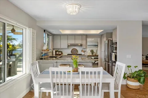 a view of swimming pool and outdoor seating