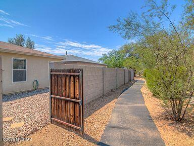 3248 West Treece Place Tucson, AZ 85742 - Photo 17 of 17 a house view with a backyard