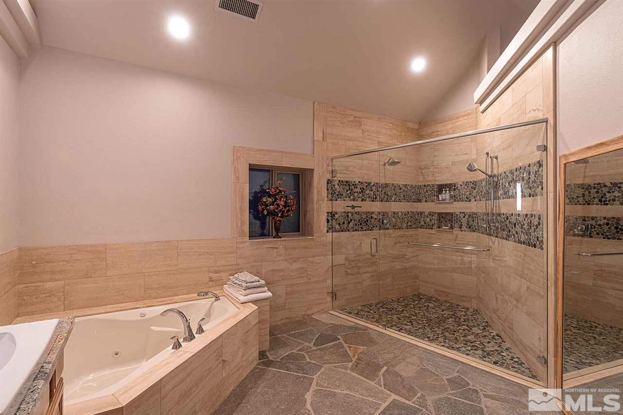 2001 Saddleback Road Reno, NV 89521 - Photo 14 of 25 a bathroom with a bathtub and a shower