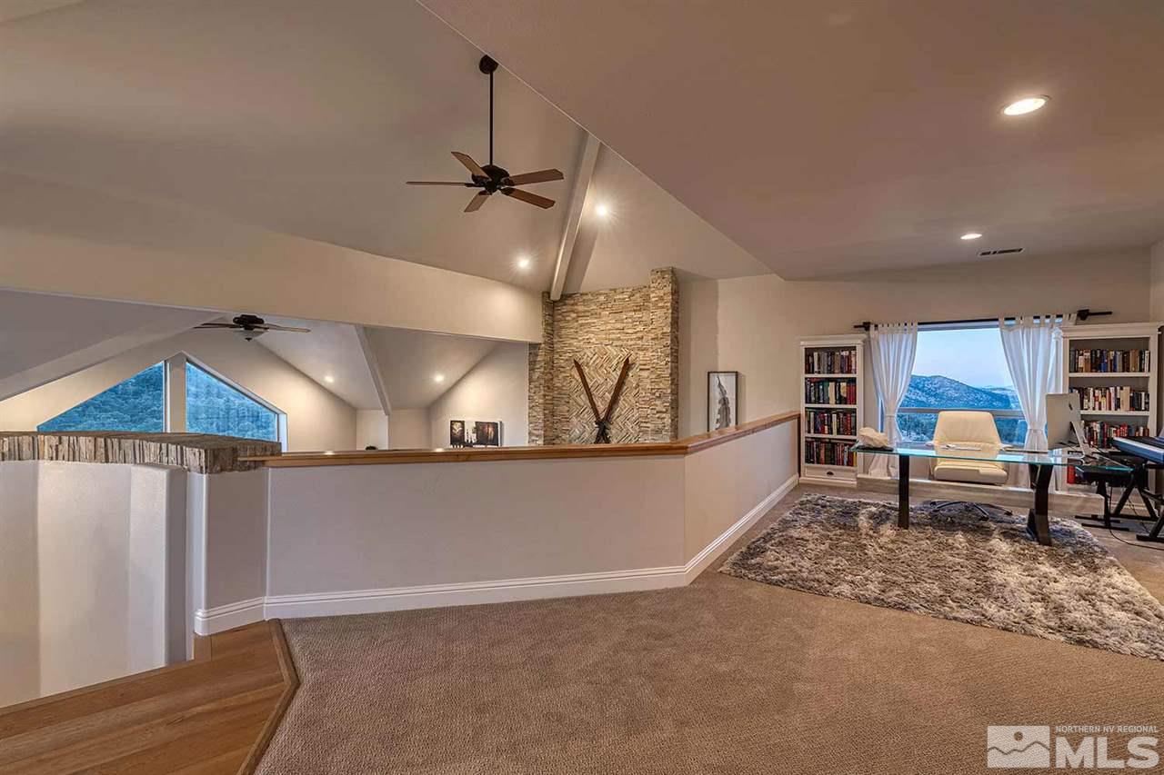 2001 Saddleback Road Reno, NV 89521 - Photo 18 of 25 a view of a livingroom with furniture and a ceiling fan
