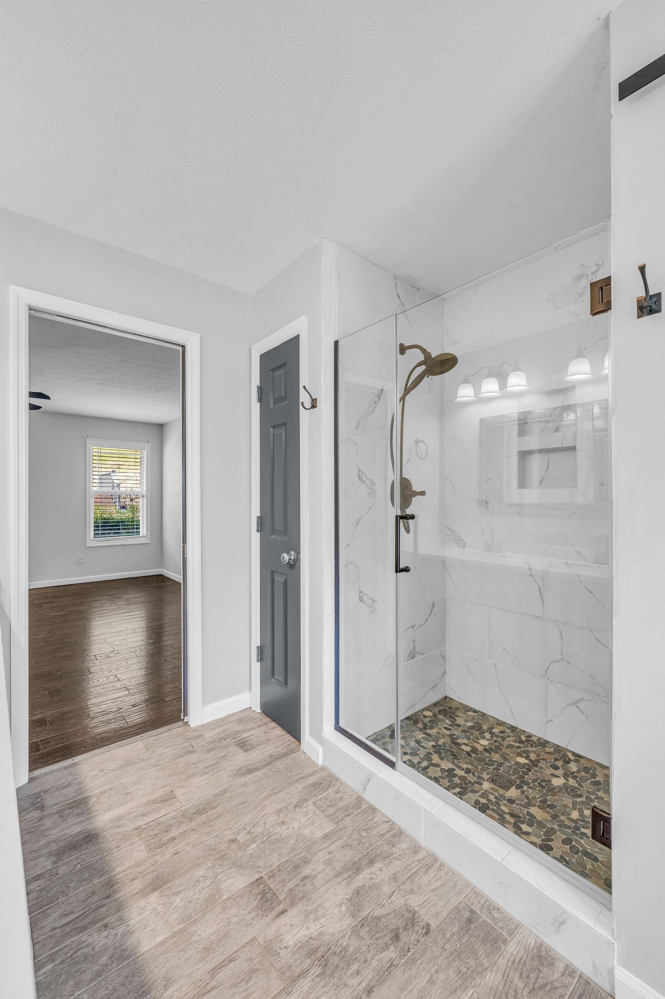240 Scenic Drive Pulaski, TN 38478 - Photo 17 of 45 a view of a bathroom with a shower and a sink