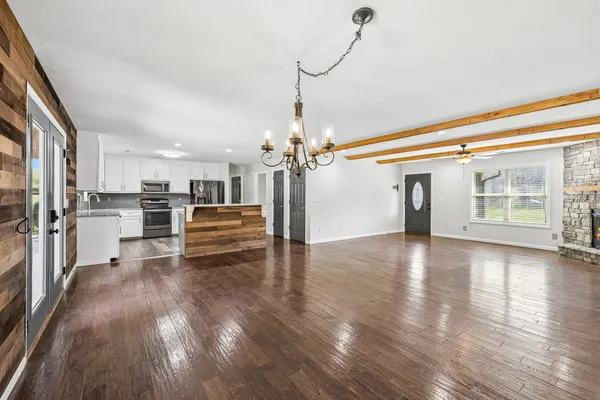 a view of a patio with wooden floor