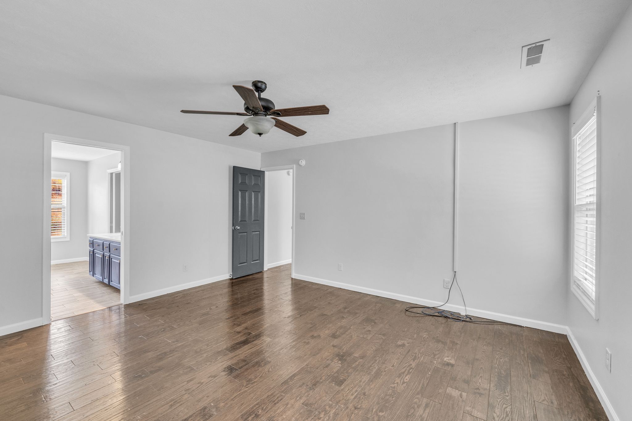 240 Scenic Drive Pulaski, TN 38478 - Photo 29 of 67 a view of an empty room with a window and a kitchen