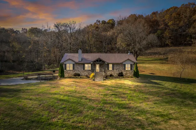 a front view of a house with swimming pool